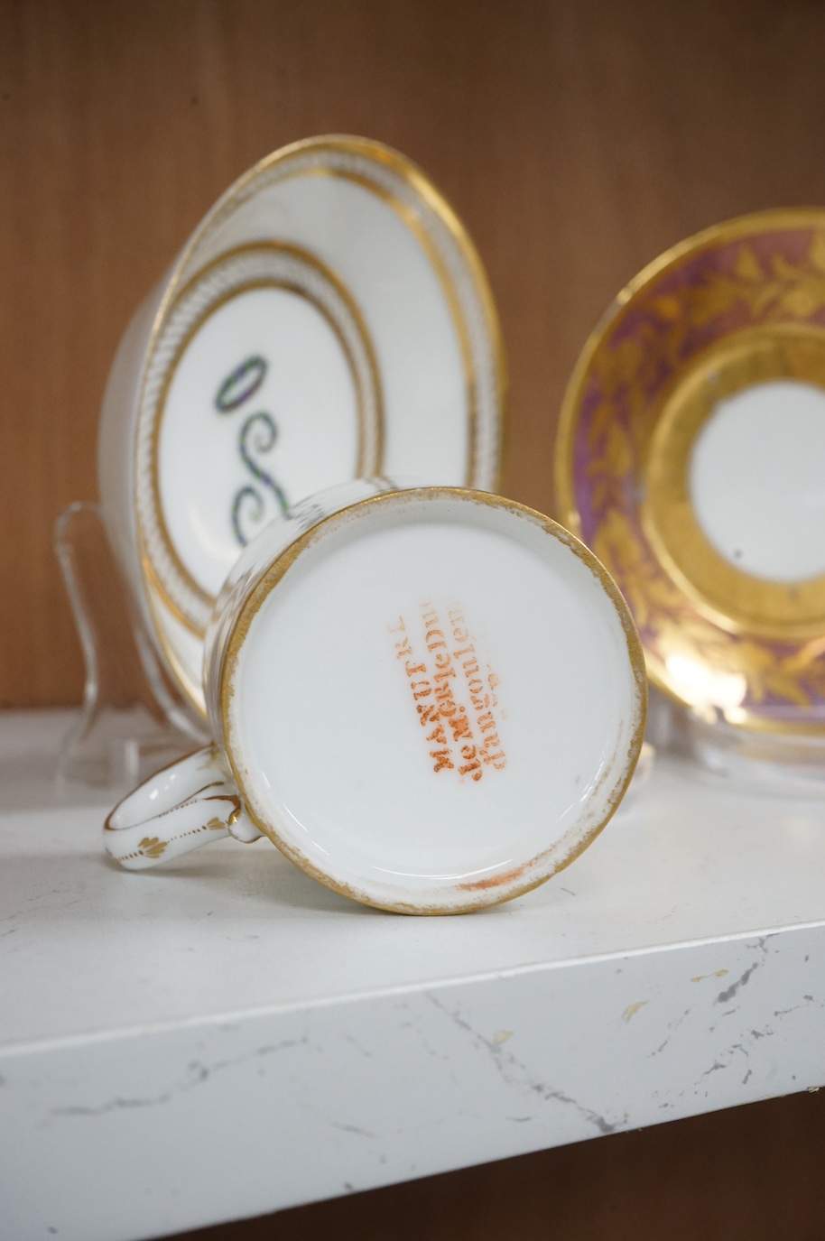 Two 19th century Paris porcelain coffee cans and saucers, cans 6cm high.